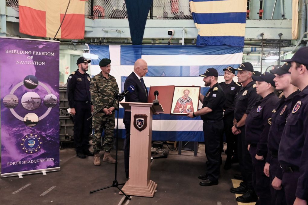 The Minister of Hellenic National Defence, Nikos Dendias giving to the Governor the icon of Agios Nikolaos, the Patron Saint of the Hellenic Navy